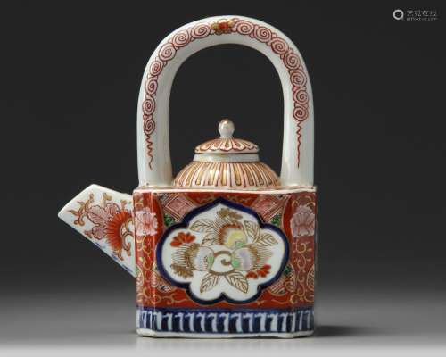 A Japanese Imari arch-handled teapot and cover