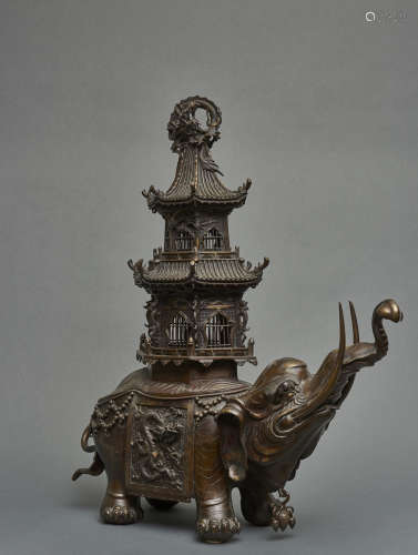 An important Japanese bronze figure of a caparisoned elephant with a pagoda on its back