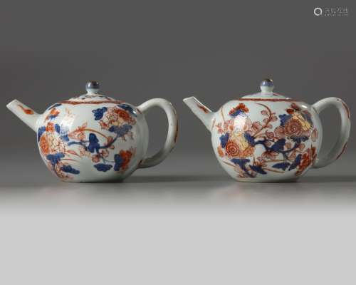 A pair of Chinese imari 'floral' teapots and covers