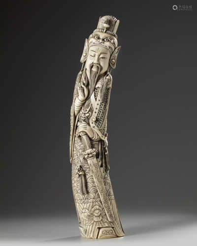 A Chinese ivory figure of Guandi