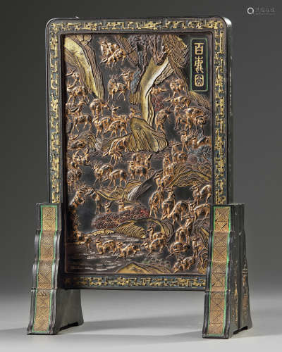 A small Chinese gilt lacquered 'hundred deer' table screen
