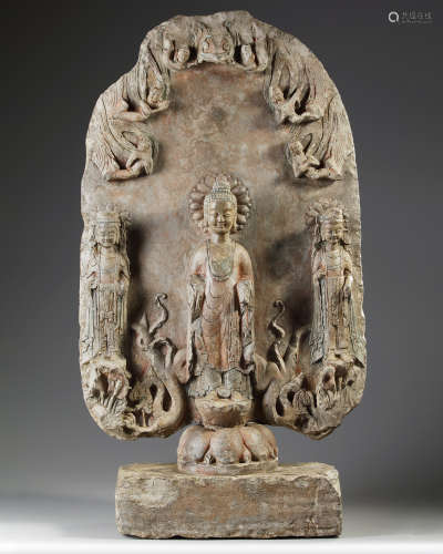 A large Chinese stone stele Buddhist triad