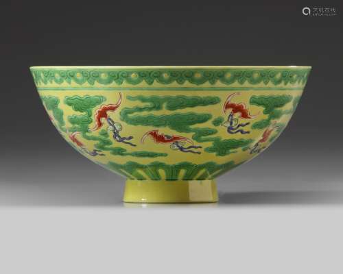 A Chinese yellow and green-enamelled 'bat' bowl with polychrome details