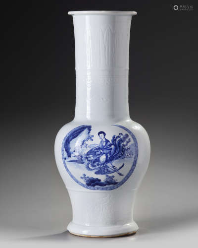 A Chinese moulded white-ground blue and white phoenix-tail vase