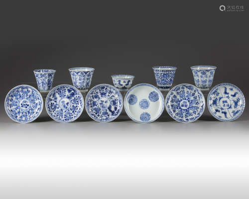 A group of eleven Chinese blue and white cups and saucers