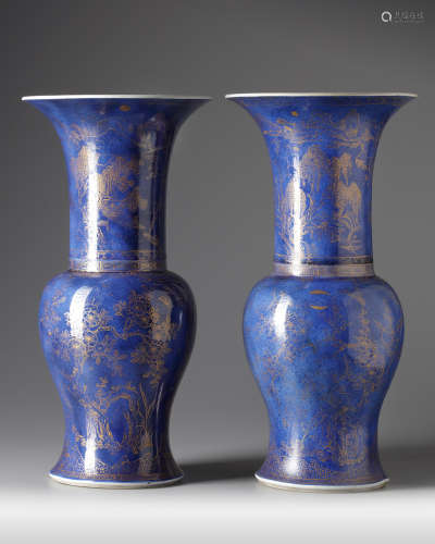 A pair of Chinese powder blue-ground gilt-decorated phoenix tail vases