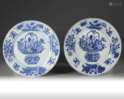 A pair of Chinese blue and white 'flower basket' dishes