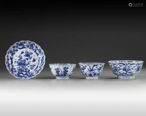 Three Chinese blue and white bowls and a dish