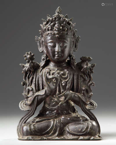 A Chinese gilt laquered bronze Guanyin