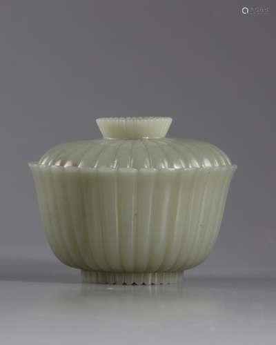 A Chinese jade carved bowl and cover