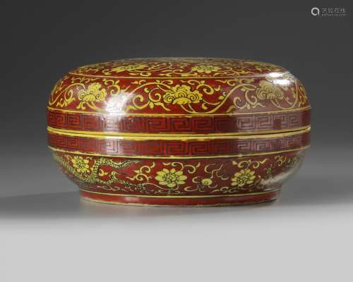 A Chinese yellow and brown enamelled box and cover