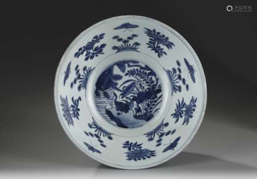 A large Chinese blue and white 'duck and lotus' bowl