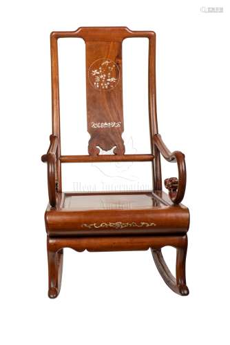 A HARDWOOD ROCKING CHAIR