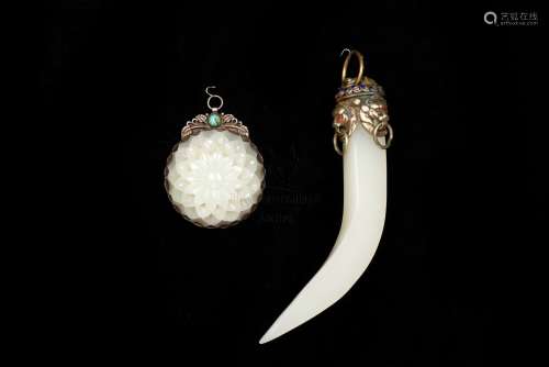 TWO JADE-INSET SILVER PENDANTS