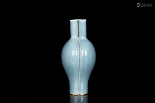 A TRILOBED PALE BLUE-GLAZED VASE