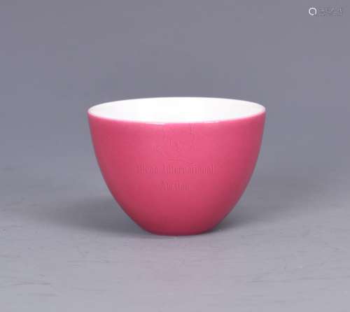 A PINK-ENAMELLED WINE CUP