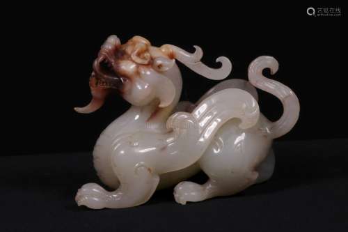 A JADE CARVING OF BEAST