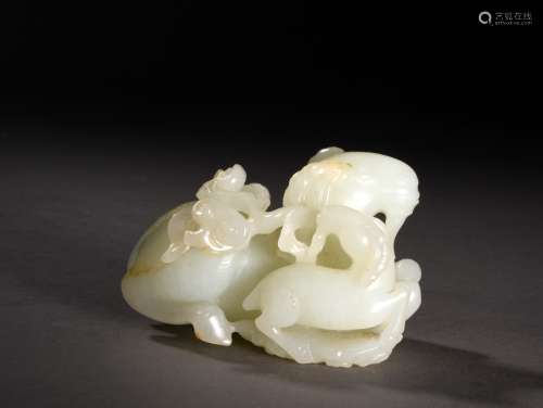 A WHITE AND RUSSET JADE RAMS GROUP, QING DYNASTY