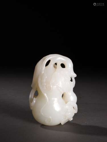 A FINE CARVED WHITE JADE GROUNDS PENDANT, QIANLONG PERIOD