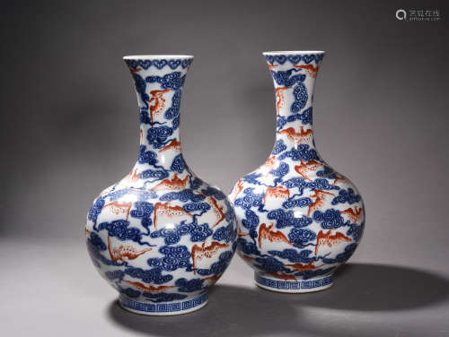 A PAIR OF BLUE AND WHITE AND IRON RED DECORATIVE VASES, XUANTONG PERIOD