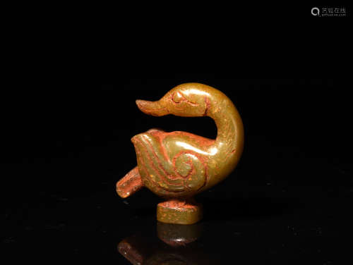A CELADON AND RUSSET DUCK