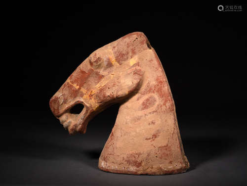 A POLYCHROME HORSE HEAD, WARRING STATES