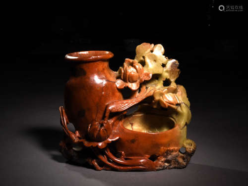 A CARVED SOAPSTONE WASHER, 19TH CENTURY