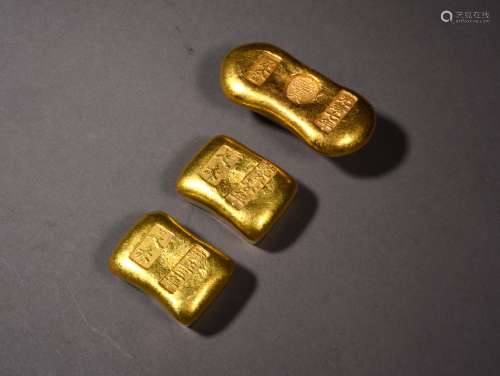THREE GOLD INGOTS, 19TH CENTURY