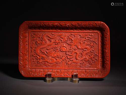 A CARVED CINNABAR LACQUER RECTANGULAR TRAY, QIANLONG PERIOD