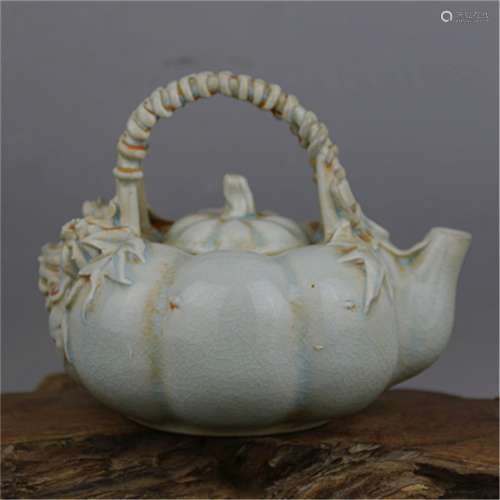 A Chinese Celadon Glazed Porcelain Tea Pot