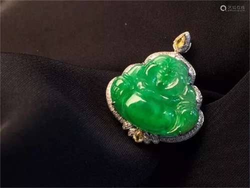 A Chinese Carved Jadeite Pendant