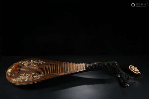 A Chinese Carved Wood Lute