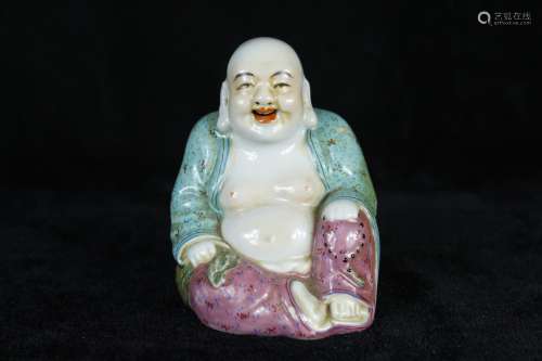 A Chinese Red and Green Glazed Porcelain Figure of Buddha