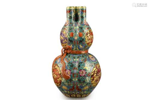 A Chinese Green Ground Enamel Glazed Porcelain Double Gourd Vase