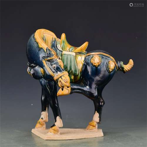 A Chinese San-Cai Glazed Porcelain Horse Decoration