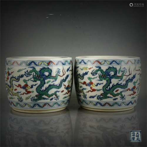 A Pair of Chinese Dou-Cai Glazed Cans with Covers