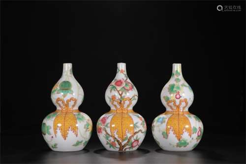 A Set of Three Chinese Famille-Rose Porcelain Double Gourd Vases