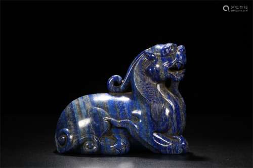 A Chinese Carved Lapis Lazuli Foo-Dog Decoration