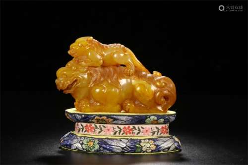 A Chinese Carved Tianhuang Foo-Dog Decoration
