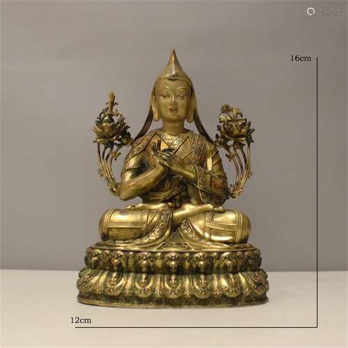 A Chinese Gilt Bronze Figure of Buddha