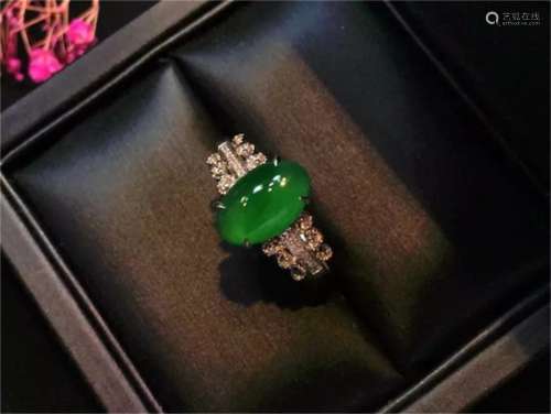 A Chinese Carved Jadeite Ring