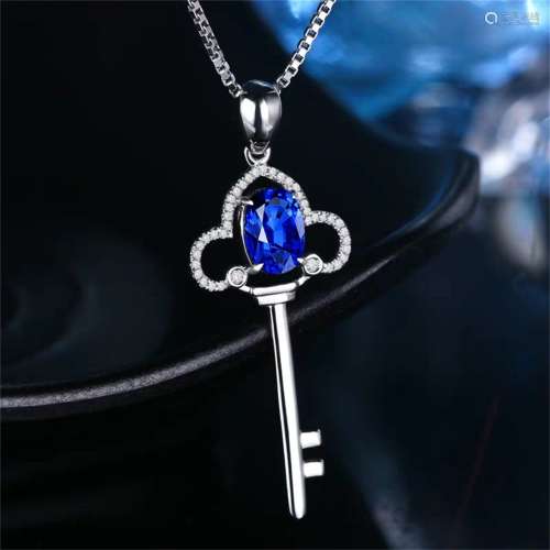 A Carved Sapphire and 18K Platinum Necklace