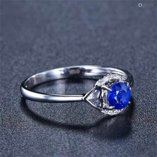 A Carved Sapphire and 18K Platinum Ring