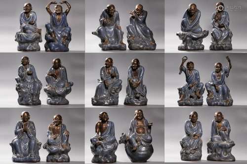 EIGHTEEN PIECES OF CHINESE SHIWAN WARE SEATED LOHAN STATUES