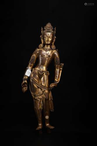 A Chinese Gilt Bronze Stand Buddha