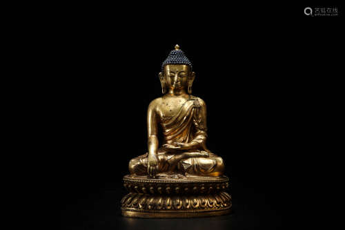 A Chinese Gilt Bronze Buddha