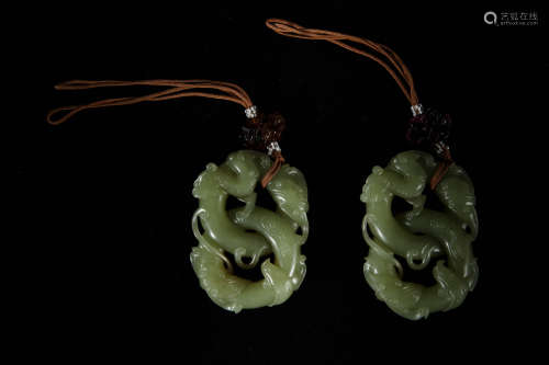 A Pair of Chinese Carved Jade Pendants