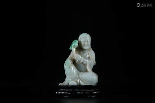 A Chinese Carved Jade Figure