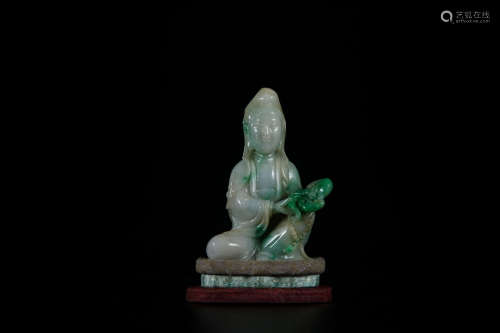 A Chinese Carved Jadeite Figure