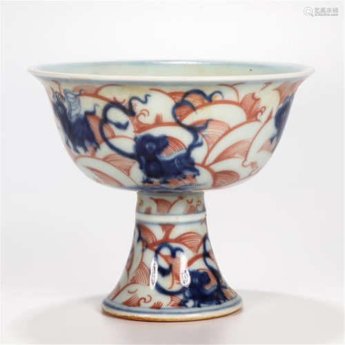 CHINESE PORCELAIN BLUE AND WHITE COPPER RED BEAST AND WAVE STEM CUP